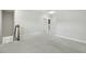Spacious bonus room with neutral carpet and a view of the staircase at 1625 Banks View Dr, Raleigh, NC 27603
