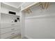 This closet features a built-in storage system and hanging rods at 1625 Banks View Dr, Raleigh, NC 27603