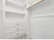 Spacious closet with custom shelving and built-in drawers at 1625 Banks View Dr, Raleigh, NC 27603