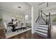 Elegant dining room showcases a modern chandelier, stylish chairs, and hardwood floors at 1625 Banks View Dr, Raleigh, NC 27603