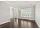 Bright dining room with large windows and modern lighting fixture, perfect for entertaining at 1625 Banks View Dr, Raleigh, NC 27603