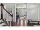 Inviting foyer with hardwood floors leads to a sitting room and features a staircase to the upper level at 1625 Banks View Dr, Raleigh, NC 27603