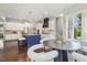 Open-concept kitchen flowing into a dining area, perfect for entertaining friends and Gathering at 1625 Banks View Dr, Raleigh, NC 27603