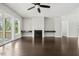 Inviting living room featuring a cozy fireplace and access to the back porch at 1625 Banks View Dr, Raleigh, NC 27603