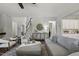 The open-concept living room features hardwood floors, modern decor, and neutral tones at 1625 Banks View Dr, Raleigh, NC 27603