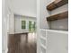 Living room with hardwood floors and butler's pantry, ideal for entertaining and relaxation at 1625 Banks View Dr, Raleigh, NC 27603
