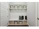 Mudroom with a built-in bench and storage cubbies for coats, shoes, and backpacks at 1625 Banks View Dr, Raleigh, NC 27603