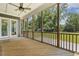 Relaxing screened porch with wood flooring, perfect for outdoor enjoyment and entertaining at 1625 Banks View Dr, Raleigh, NC 27603