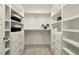 Well-organized walk-in closet with custom shelving and ample storage space at 1625 Banks View Dr, Raleigh, NC 27603
