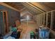 Unfinished attic area provides ample storage and has potential for other uses at 167 Sequoia Dr, Timberlake, NC 27583