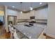 Stylish kitchen island with granite countertops, stainless steel appliances, and white cabinetry at 167 Sequoia Dr, Timberlake, NC 27583