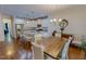 Well-lit kitchen and dining area featuring modern appliances and ample counter space at 167 Sequoia Dr, Timberlake, NC 27583