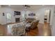 Inviting living room features a fireplace, hardwood floors, and plush seating, creating a warm and comfortable atmosphere at 167 Sequoia Dr, Timberlake, NC 27583