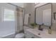 Updated bathroom features white subway tile in the shower and modern vanity at 1708 Forest Rd, Durham, NC 27705