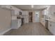 Modern white kitchen with stainless steel appliances and lots of counter space at 1708 Forest Rd, Durham, NC 27705