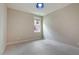 Neutral bedroom featuring a single window, plush carpet, and neutral paint at 1962 Briar Chapel Pkwy, Chapel Hill, NC 27516