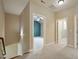 Upstairs hallway leading to bedrooms with neutral carpet and wall colors at 1962 Briar Chapel Pkwy, Chapel Hill, NC 27516