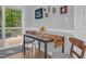 Bright breakfast nook with a backyard deck view at 200 Holly Branch Dr, Holly Springs, NC 27540