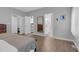 This spacious main bedroom provides entry to the ensuite bathroom and the walk-in closet at 200 Holly Branch Dr, Holly Springs, NC 27540