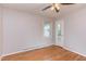 Bedroom offers hardwood floors, natural light, and a rear door to the backyard at 2009 Carolina Ave, Durham, NC 27705