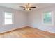 Bedroom features hardwood floors and great natural light from windows at 2009 Carolina Ave, Durham, NC 27705