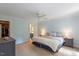 Well-lit main bedroom features neutral tones, carpeted floors, and lots of natural light at 201 Cobblestone Dr, Chapel Hill, NC 27516