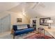 Attic bedroom featuring a futon couch, ceiling fan and unique decor at 201 Cobblestone Dr, Chapel Hill, NC 27516