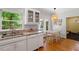 Bright kitchen showcases granite countertops, stainless steel appliances, and natural lighting at 201 Cobblestone Dr, Chapel Hill, NC 27516