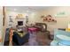 Cozy living room with fireplace, carpet and comfortable seating at 201 Cobblestone Dr, Chapel Hill, NC 27516