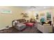 Inviting living room with fireplace, carpet and lots of natural light at 201 Cobblestone Dr, Chapel Hill, NC 27516