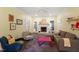 Cozy living room with fireplace, carpet and comfortable seating at 201 Cobblestone Dr, Chapel Hill, NC 27516