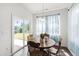 Cozy breakfast nook with natural light and a view of the backyard at 202 E Painted Way, Clayton, NC 27527
