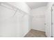 Walk-in closet with shelving for storage at 202 E Painted Way, Clayton, NC 27527