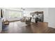 Open-concept layout with a modern kitchen, comfortable seating, and plenty of natural light, ideal for entertaining at 202 E Painted Way, Clayton, NC 27527