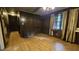 Spacious kitchen with hardwood floors, a window, and ample counter space at 2100 N Webb St, Selma, NC 27576