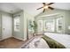 Spacious bedroom with large windows, natural light, and vaulted ceiling at 2309 King Malcolm Ln, Zebulon, NC 27597
