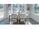Cozy dining room with table, chairs, large windows and natural light at 233 Steel Spring Rd # 24, Angier, NC 27501