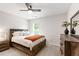 Comfortable bedroom featuring natural light, a ceiling fan, and neutral decor at 238 Lynchwick Ln, Durham, NC 27703