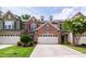 Charming townhome with attached garage and manicured lawn at 238 Lynchwick Ln, Durham, NC 27703