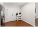 Bright area with a stainless steel refrigerator next to a white door at 238 Lynchwick Ln, Durham, NC 27703