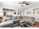 Spacious living room with large sectional couch and stylish decor at 238 Lynchwick Ln, Durham, NC 27703