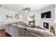Cozy living room with fireplace, tv, and comfortable seating at 238 Lynchwick Ln, Durham, NC 27703