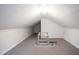Spacious, finished attic with neutral carpet and dormer windows for ample light at 2423 Farthing St, Durham, NC 27704