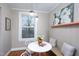 Inviting dining nook boasts natural light, neutral tones, and modern decor at 2423 Farthing St, Durham, NC 27704