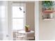 Bright dining area features a window, modern lighting, and comfortable seating arrangement at 2423 Farthing St, Durham, NC 27704