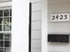 Close up exterior of home with address plate and mailbox at 2423 Farthing St, Durham, NC 27704