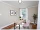 Comfortable home office with a desk, chair, and natural light creating an ideal space for work and creativity at 2423 Farthing St, Durham, NC 27704