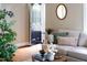 Cozy living room with hardwood floors and a view of the front door at 2423 Farthing St, Durham, NC 27704