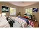 Modern bedroom showcasing a stylish accent wall and contemporary decor at 2428 Perkins Rd, Durham, NC 27705