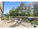 Spacious back deck with outdoor seating and a grill, perfect for entertaining at 244 Lasswade Ct, Zebulon, NC 27597